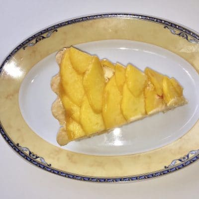 creamy peach tart with smoky almond crust